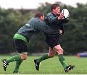27 September 1999; Ireland's Brian O'Driscoll is tackled by Paul Wallace. Ireland Rugby Squad Training, The Garda Club, Westmanstown, Lucan, Co. Dublin. Picture credit: Matt Browne / SPORTSFILE