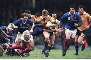 6 November 1999; Tim Horan, Australia, in action against Raphael Ibanez, France. 1999 Rugby World Cup, Australia v France, Millennium Stadium, Cardiff, Wales. Picture credit: Brendan Moran / SPORTSFILE
