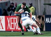 20 October 1999; Matt Mostyn, Ireland, is tackled by Ignacio Corletto, Argentina. Rugby World cup, Stade Felix Bollaert, Lens, France. Picture credit; Matt Browne / SPORTSFILE