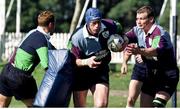 28 May 1999; Ireland's Paddy Johns (center) is tackled by Mike Mullins (left) and David Corkery during training. Ireland Rugby Squad Training, Shore School Playing Fields, Northbridge, Sydney, Australia. Picture credit: Matt Browne / SPORTSFILE