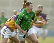 20 March 2005; Mark Foley, Limerick, in action against Michael Jordan, Wexford. Allianz National Hurling League, Division 1B, Wexford v Limerick, Wexford Park, Wexford. Picture credit; Matt Browne / SPORTSFILE