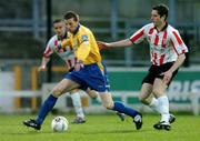 8 April 2005; Jim Crawford, Shelbourne, in action against Ruaidri Higgins, Derry City. eircom League, Premier Division, Derry City v Shelbourne, Brandywell, Derry. Picture credit; David Maher / SPORTSFILE
