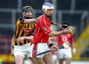 10 April 2005; Ronan Curran, Cork, in action against Martin Comerford, Kilkenny. Allianz National Hurling League, Division 1, Cork v Kilkenny, Pairc Ui Chaoimh, Cork. Picture credit; Brendan Moran / SPORTSFILE