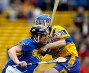 10 April 2005; Benny Dunne, Tipperary, in action against Frank Lohan, Clare. Allianz National Hurling League, Division 1, Tipperary v Clare, Semple Stadium, Thurles, Co. Tipperary. Picture credit; Ray McManus / SPORTSFILE