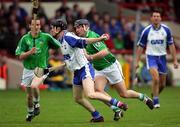 10 April 2005; John Mullane, Waterford, in action against  TJ Ryan and Donie Ryan, left, Limerick. Allianz National Hurling League, Division 1, Limerick v Waterford, Gaelic Grounds, Limerick. Picture credit; Kieran Clancy / SPORTSFILE