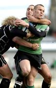 10 April 2005; Paul Warwick, Connacht, is tackled by Jason Spice, centre, and Duncan Jones, The Ospreys. Celtic League 2004-2005, Pool 1, Connacht v Neath-Swansea Ospreys, Sportsground, Galway. Picture credit; David Maher / SPORTSFILE