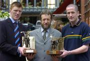 11 April 2005; GAA President Sean kelly with Clare hurler Niall Gilligan who was presented with the Vodafone Player of the Month award for the month of March for Hurling, left and Tyrone footballer Stephen O'Neill who was presented with the Vodafone Player of the Month award for the month of March for, right. Westbury Hotel, Dublin. Picture credit; Pat Murphy / SPORTSFILE