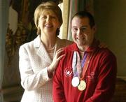 11 April 2005; Special Olympics Athlete Liam Weir, from Dungannon, Co. Tyrone, with President Mary McAleese at a reception, in Aras an Uachtarain, to celebrate the achievements of the Team Ireland at the 2005 Special Olympics World Winter Games, held recently in Japan. Aras an Uachtarain, Phoenix park, Dublin. Picture credit; Ray McManus / SPORTSFILE