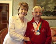 11 April 2005; Special Olympics Athlete Finbar Hughes, from Dungannon, Co. Tyrone, with President Mary McAleese at a reception, in Aras an Uachtarain, to celebrate the achievements of the Team Ireland at the 2005 Special Olympics World Winter Games, held recently in Japan. Aras an Uachtarain, Phoenix park, Dublin. Picture credit; Ray McManus / SPORTSFILE