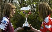 13 April 2005; Galway captain Annette Clarke, left and  Cork captain Juliet Murphy take a close look at the Ladies National Football League cup at a photocall ahead of the Suzuki Ladies National Football League Final. Merrion Square, Dublin. Picture credit; Pat Murphy / SPORTSFILE