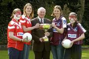 13 April 2005; Cork captain Juliet Murphy, left, and Galway captain Annette Clarke with Niall O'Gorman, General Manager Suzuki Ireland, and local schoolchildren Sorcha Ni Shiordain, extreme left, and Cloda Nic An Ri, extreme right, at a photocall ahead of the Suzuki Ladies National Football League Final. Merrion Square, Dublin. Picture credit; Pat Murphy / SPORTSFILE