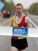 9 April 2005; Robert Fitzsimons, Tallaght A.C., approaches the finish to win the juvenille section of the BUPA Great Ireland Run. Phoenix Park, Dublin. Picture credit; Brian Lawless / SPORTSFILE
