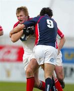 15 April 2005; Roger Wilson, Ulster, is tackled by Mike Phillips, Llanelli Scarlets. Celtic League 2004-2005, Pool 1, Ulster v Llanelli Scarlets, Ravenhill, Belfast. Picture credit; Oliver McVeigh / SPORTSFILE