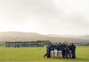 5 January 2014; The Kerry team gather in a huddle during their warm-up before the game. McGrath Cup, Quarter-Final, Kerry v Institute of Technology Tralee, John Mitchels GAA Club, Farmer's Bridge, Tralee, Co. Kerry. Picture credit: Brendan Moran / SPORTSFILE