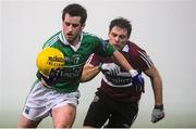 8 January 2014; Niall McElroy, Fermanagh, in action against James Duffy, St Mary's. Power NI Dr. McKenna Cup, Section B, Round 1, Fermanagh v St Mary's, Brewster Park, Enniskillen, Co. Fermanagh. Picture credit: Oliver McVeigh / SPORTSFILE