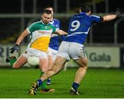 8 January 2014; Ken Casey, Offaly, in action against John O'Loughlin, Laois. Bord na Mona O'Byrne Cup, Group A, Round 2, Laois v Offaly, O'Moore Park, Portlaoise, Co. Laois. Picture credit: Ramsey Cardy / SPORTSFILE