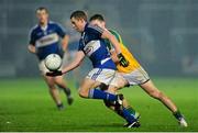 8 January 2014; Stephen Attride, Laois, in action against Ciaran Hurley, Offaly. Bord na Mona O'Byrne Cup, Group A, Round 2, Laois v Offaly, O'Moore Park, Portlaoise, Co. Laois. Picture credit: Ramsey Cardy / SPORTSFILE
