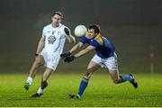 8 January 2014; Kevin Diffley, Kildare, in action against Cathal McNally, Longford. Bord na Mona O'Byrne Cup, Group B, Round 2, Longford v Kildare, Newtowncashel, Co. Longford. Picture credit: David Maher / SPORTSFILE