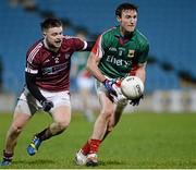 10 January 2014; Cathal Freeman, Mayo, in action against Ciaran O'Domhnaill, NUIG. FBD League Section A, Round 1, Mayo v NUIG, Elverys MacHale Park, Castlebar, Co. Mayo. Picture credit: Matt Browne / SPORTSFILE