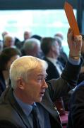 16 April 2005; Roscommon delegate Tommy Kennoy voting on Motion 12 at the 2005 GAA Congress. Croke Park, Dublin. Picture credit; Ray McManus / SPORTSFILE