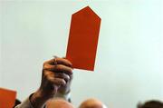 16 April 2005; A delegate voting on Motion 12 at the 2005 GAA Congress. Croke Park, Dublin. Picture credit; Ray McManus / SPORTSFILE