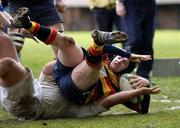 16 April 2005; Andy Tallon, Lansdowne, goes over for his try despite the tackle od Guiermo Barsano, Dublin University. AIB All Ireland League 2004-2005, Division 1, Lansdowne v Dublin University, Lansdowne Road, Dublin. Picture credit; Matt Browne / SPORTSFILE