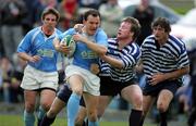 16 April 2005; Billy Treacy, Garryowen, is tackled by David Gavin, Blackrock College. AIB All Ireland League 2004-2005, Division 1, Garryowen v Blackrock College, Dooradoyle, Limerick. Picture credit; Kieran Clancy / SPORTSFILE