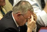 16 April 2005; GAA Presidential candidate Christy Cooney holds his head in his hands after defeat in the election during the 2005 GAA Congress. Croke Park, Dublin. Picture credit; Pat Murphy / SPORTSFILE