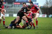 16 April 2005; Frankie Sheahan and Rob Henderson, Munster, is tackled by Hugo Southwell , Edinburgh Rugby. Celtic League 2004-2005, Pool 1, Munster v Edinburgh Rugby, Thomond Park, Limerick. Picture credit; Kieran Clancy / SPORTSFILE