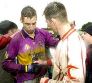 17 April 2005; Mattie Forde, Wexford, is congratulated by Tyrone's Shane Sweeney. Allianz National Football League, Division 1 Semi-Final, Tyrone v Wexford, O'Moore Park, Portlaoise, Co. Laois. Picture credit; Pat Murphy / SPORTSFILE