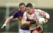 17 April 2005; Sean Cavanagh, Tyrone, in action against Nicky Lambert, Wexford. Allianz National Football League, Division 1 Semi-Final, Tyrone v Wexford, O'Moore Park, Portlaoise, Co. Laois. Picture credit; Pat Murphy / SPORTSFILE