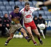 17 April 2005; John Hegarty, Wexford, in action against Colin Holmes, Tyrone. Allianz National Football League, Division 1 Semi-Final, Tyrone v Wexford, O'Moore Park, Portlaoise, Co. Laois. Picture credit; Pat Murphy / SPORTSFILE