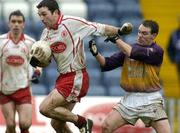 17 April 2005; Martin Penrose, Tyrone, in action against Colm Morris, Wexford. Allianz National Football League, Division 1 Semi-Final, Tyrone v Wexford, O'Moore Park, Portlaoise, Co. Laois. Picture credit; Pat Murphy / SPORTSFILE