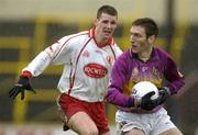17 April 2005; Redmond Barry, Wexford, in action against Colin Holmes, Tyrone. Allianz National Football League, Division 1 Semi-Final, Tyrone v Wexford, O'Moore Park, Portlaoise, Co. Laois. Picture credit; Pat Murphy / SPORTSFILE