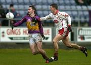 17 April 2005; Darragh Breen, Wexford, in action against Colin Holmes, Tyrone. Allianz National Football League, Division 1 Semi-Final, Tyrone v Wexford, O'Moore Park, Portlaoise, Co. Laois. Picture credit; Pat Murphy / SPORTSFILE