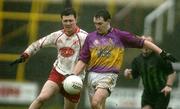 17 April 2005; Colm Morris, Wexford, in action against Clin Holmes, Tyrone. Allianz National Football League, Division 1 Semi-Final, Tyrone v Wexford, O'Moore Park, Portlaoise, Co. Laois. Picture credit; Pat Murphy / SPORTSFILE