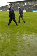 17 April 2005; Armagh manager Joe Kernan, left, and match referee Maurice Deegan during a pitch inspection in advance of the match being called off. Allianz National Football League, Division 1 Semi-Final, Mayo v Armagh, Dr. Hyde Park, Roscommon. Picture credit; Ray McManus / SPORTSFILE
