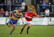 17 April 2005; Gerry O'Grady, Clare, in action against Ben O'Connor, Cork. Allianz National Hurling League, Division 1, Round 2, Clare v Cork, Cusack Park, Ennis, Co. Clare. Picture credit; Kieran Clancy / SPORTSFILE