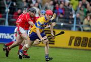 17 April 2005; Brian Lohan, Clare, in action against Brian Corcoran, Cork. Allianz National Hurling League, Division 1, Round 2, Clare v Cork, Cusack Park, Ennis, Co. Clare. Picture credit; Kieran Clancy / SPORTSFILE
