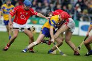 17 April 2005; Brian Lohan, Clare, in action against Brian Corcoran and Tom Kenny, Cork. Allianz National Hurling League, Division 1, Round 2, Clare v Cork, Cusack Park, Ennis, Co. Clare. Picture credit; Kieran Clancy / SPORTSFILE
