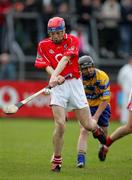 17 April 2005; Tom Kenny, Cork, in action against Jonathan Clancy, Clare . Allianz National Hurling League, Division 1, Round 2, Clare v Cork, Cusack Park, Ennis, Co. Clare. Picture credit; Kieran Clancy / SPORTSFILE