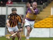 17 April 2005; David O'Brien, Wexford, in action against JJ Delaney, Kilkenny. Allianz National Hurling League, Division 1, Round 2, Kilkenny v Wexford, Nowlan Park, Kilkenny. Picture credit; Matt Browne / SPORTSFILE