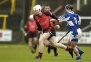 17 April 2005; Brendan McGourty, Down, in action against James Walsh, Laois. Allianz National Hurling League, Division 1, Relegation Section, Laois v Down, O'Moore Park, Portlaoise, Co. Laois. Picture credit; Pat Murphy / SPORTSFILE