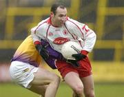 17 April 2005; Enda McGinley, Tyrone, in action against Philip Wallace, Wexford. Allianz National Football League, Division 1 Semi-Final, Tyrone v Wexford, O'Moore Park, Portlaoise, Co. Laois. Picture credit; Pat Murphy / SPORTSFILE