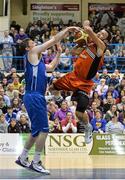 10 January 2014; Isaac Westbrooks, Killester, is fouled by Niall O'Reilly, C&S UCC Demons. Basketball Ireland Men's National Cup Semi-Final 2014, C&S UCC Demons v Killester, Neptune Stadium, Cork. Picture credit: Brendan Moran / SPORTSFILE