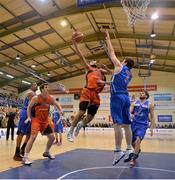 10 January 2014; Isaac Westbrooks, Killester, goes up for a shot against Ciaran O'Sullivan, C&S UCC Demons. Basketball Ireland Men's National Cup Semi-Final 2014, C&S UCC Demons v Killester, Neptune Stadium, Cork. Picture credit: Brendan Moran / SPORTSFILE