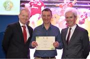 10 January 2014; Today the GAA held their Games Development Conference with the theme &quot; Inspiring Children: Fostering a Love of Gaelic Games&quot;. Roger Keenan is presented with his certificate for GAA Lead Tutor Trainer by Micheál Martin, left, Chairman National Games Committee, and Michael McGeehin, right, Director Coaching Ireland. Liberty Insurance Coaching Development Conference, Croke Park, Dublin. Picture credit: Barry Cregg / SPORTSFILE