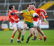 12 January 2014; Eamon Doherty, Donegal, in action against Mark Shields, Armagh. Power NI Dr. McKenna Cup, Section A, Round 2, Armagh v Donegal, Athletic Grounds, Armagh. Picture credit: Oliver McVeigh / SPORTSFILE