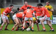 12 January 2014; Donegal's Michael Murphy, supported by team-mate Dermot Molloy, is put under pressure by Armagh's Kieran Toner, Charlie Vernon, Andy Mallon, James Lavery, Finian Moriarty, and Ciaran Rafferty. Power NI Dr. McKenna Cup, Section A, Round 2, Armagh v Donegal, Athletic Grounds, Armagh. Picture credit: Oliver McVeigh / SPORTSFILE