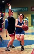 11 March 1999; Aoibheann Connor of Scoil Mhuire, Portarlington, in action against Mairead O'Toole of St Josephs, Lucan, during the All-Ireland Schools Senior D Final match between Scoil Mhuire, Portarlington, Laois, and St Josephs, Lucan, Dublin, at the National Basketball Arena in Dublin. Photo by Brendan Moran/Sportsfile